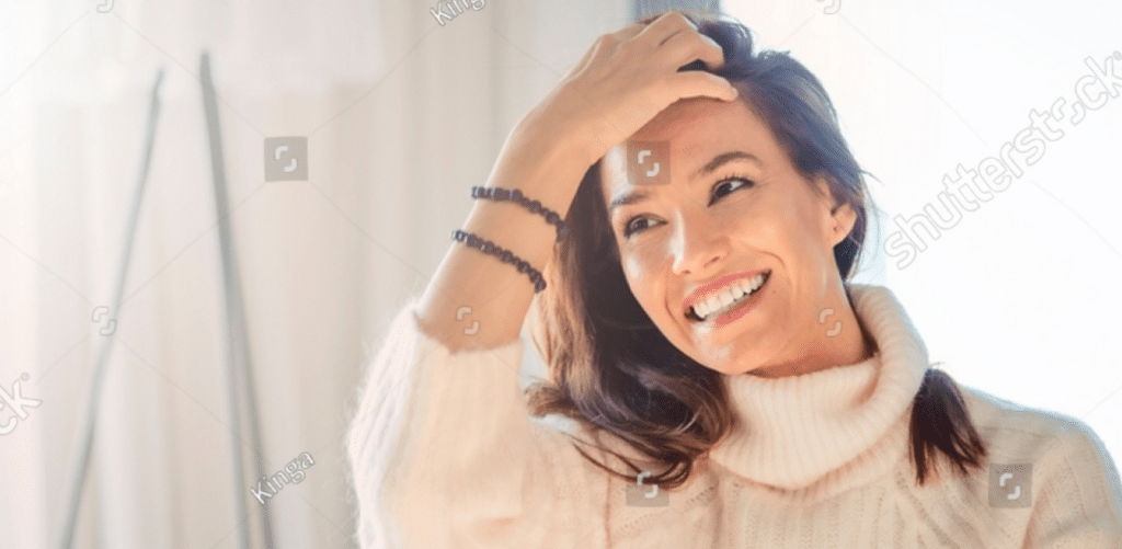 stock photo shot of cheerful woman relaxing on the sofa at home attractive woman wearing casual clothes while 2104494953 1 1